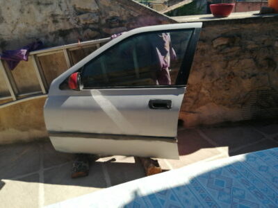 Banc de musculation en bon état et porte avant gauche Peugeot 406 très bon état